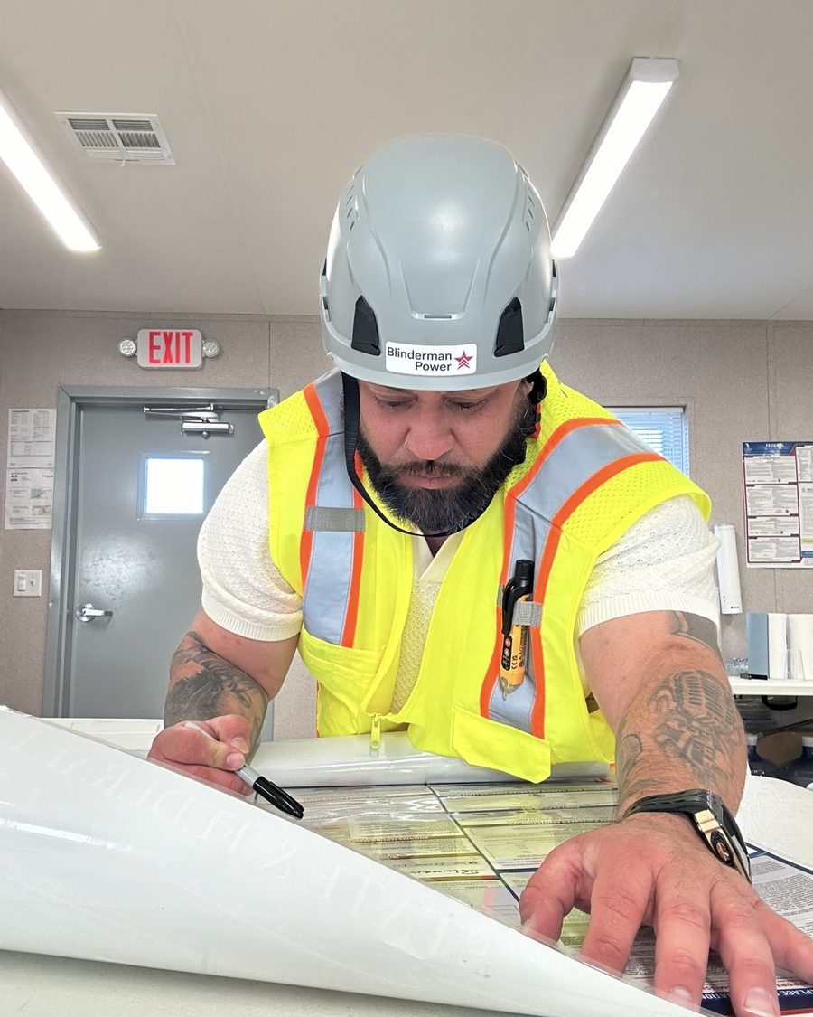 Kevin Valdivia, CEO of Valdivia Safety Pros, reviewing site documentation